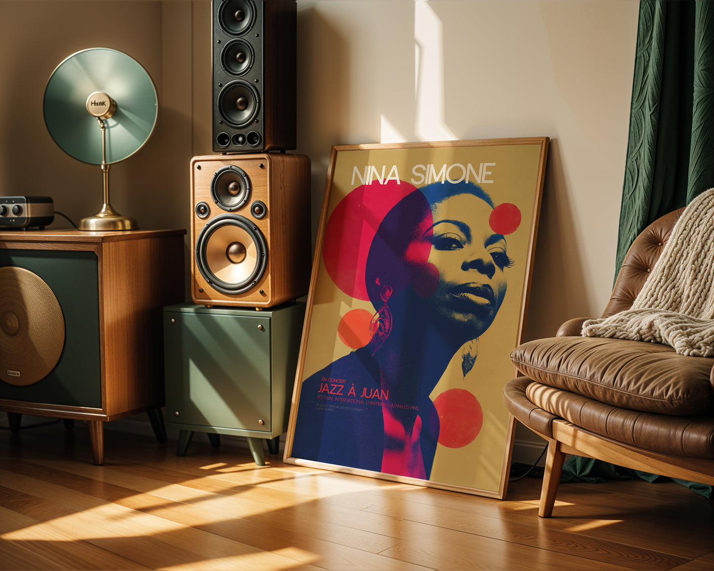 Room interior with speakers, a lamp, and a Nina Simone poster on a wall.