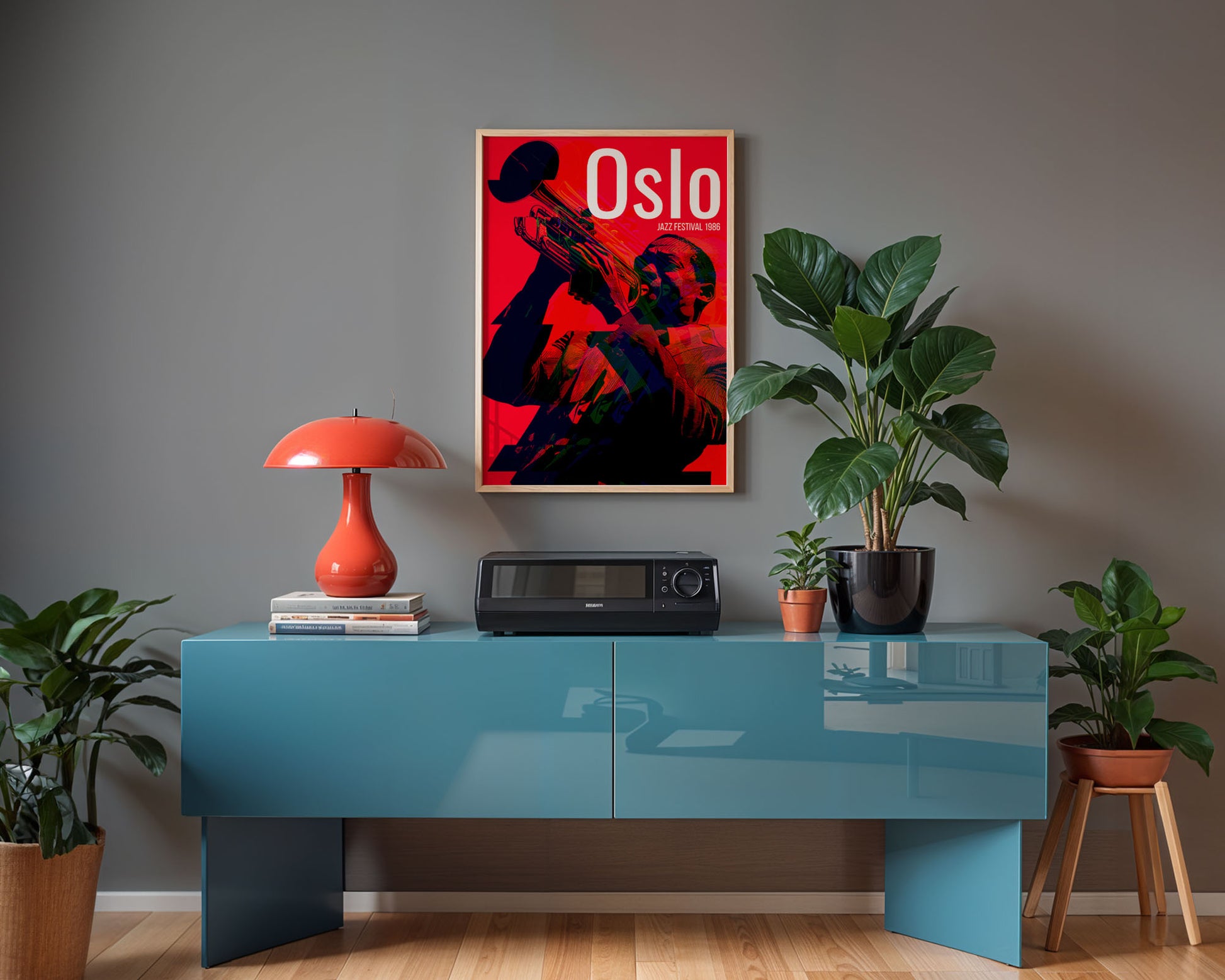 Modern interior with a blue console table, red lamp, and 'Oslo' poster on a gray wall.