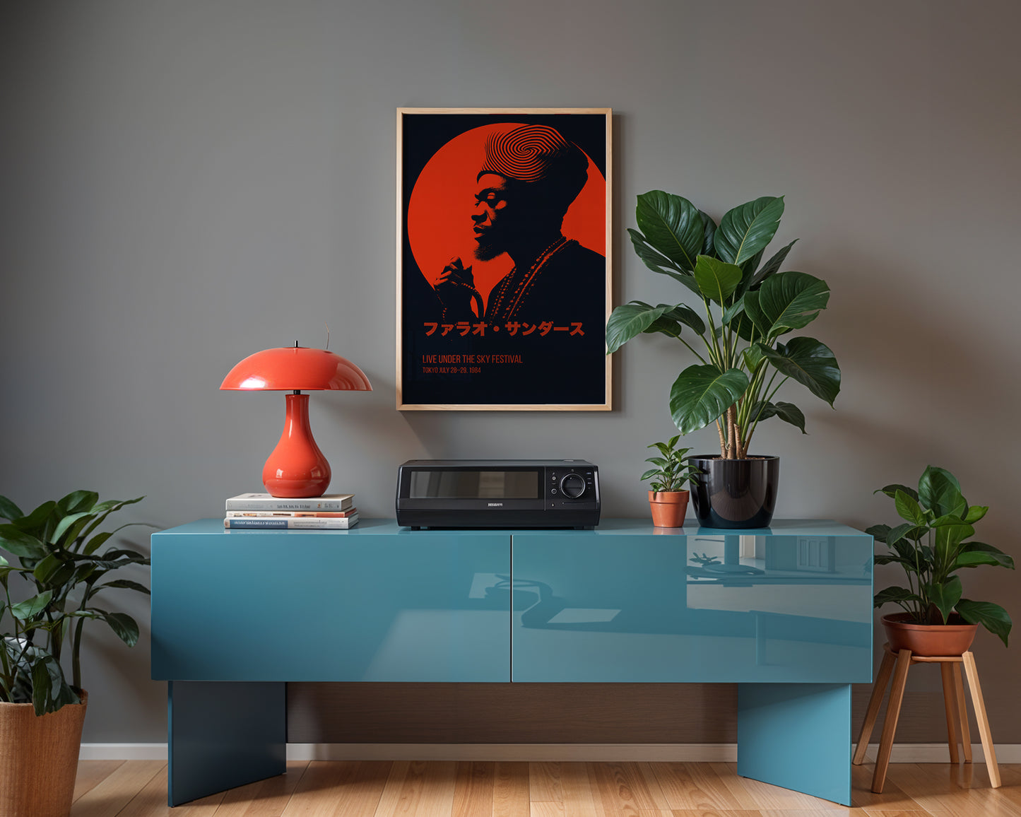 Modern interior with a blue console table, red lamp, and framed Tokyo Jazz Festival Print on a gray wall.