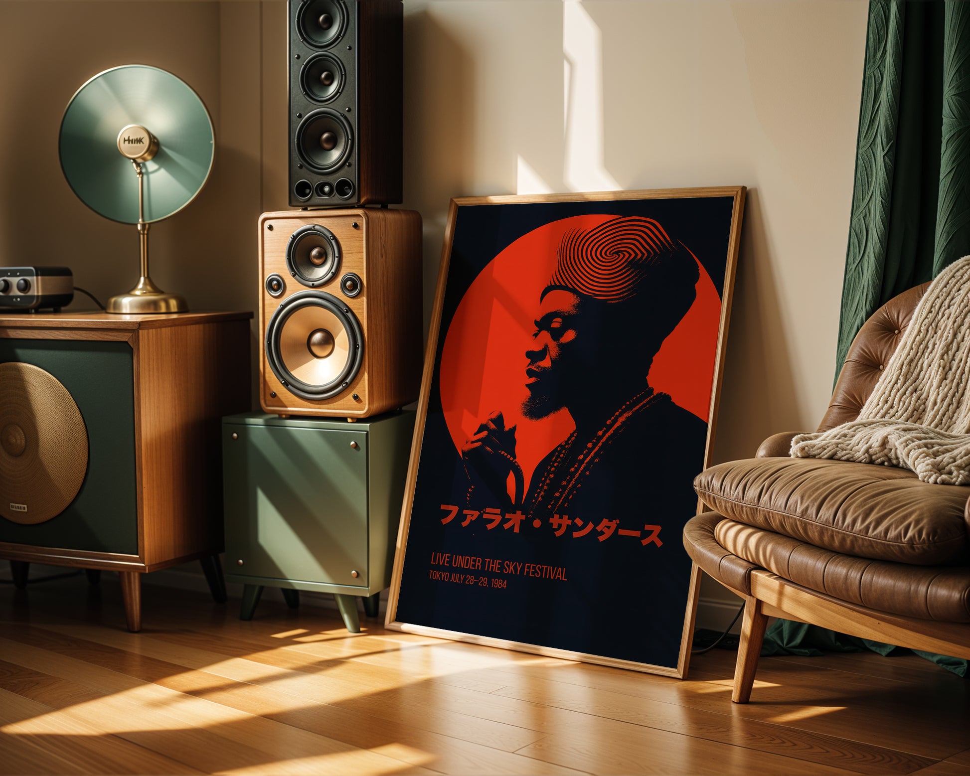 Room interior with speakers, a lamp, and a framed poster of a person playing a saxophone.
