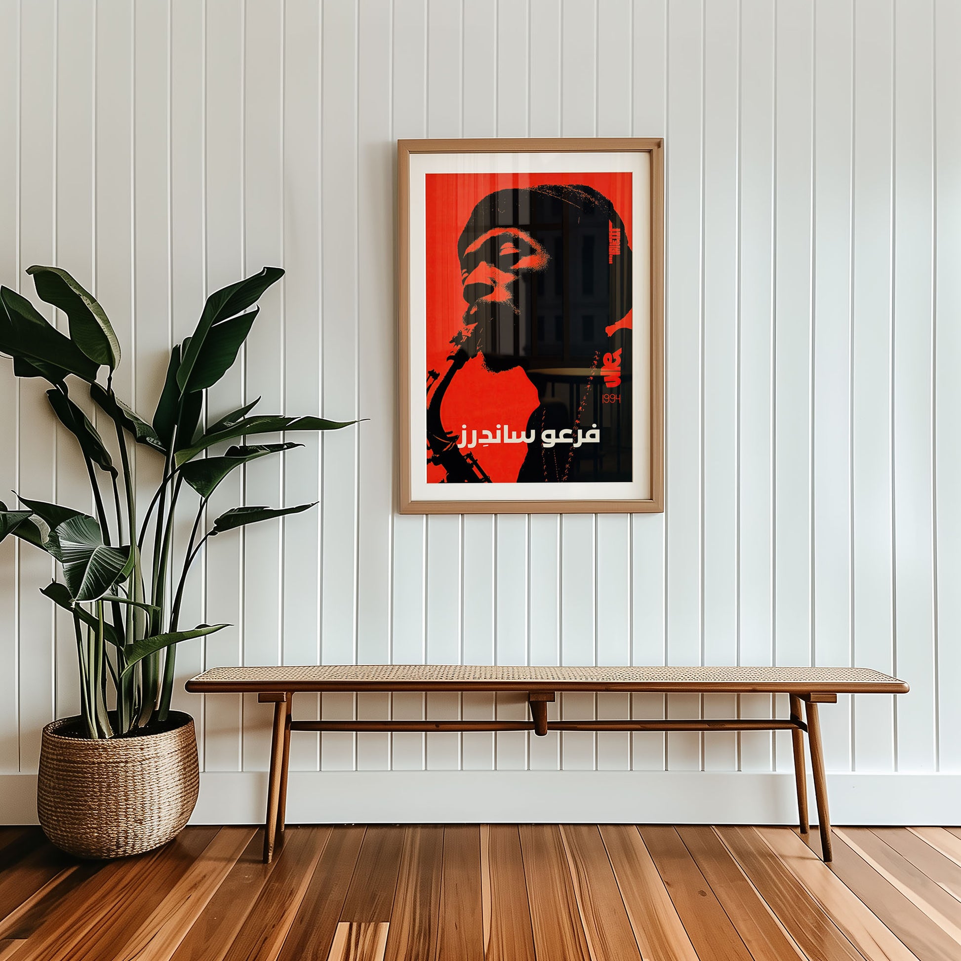 Framed mid-century style wall art print styled against minimalist interior wall