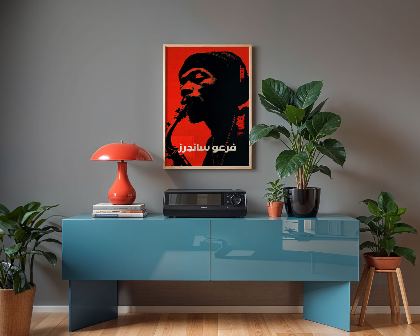Mid-century inspired art poster styled above a home stereo system in a Scandinavian inspired living space