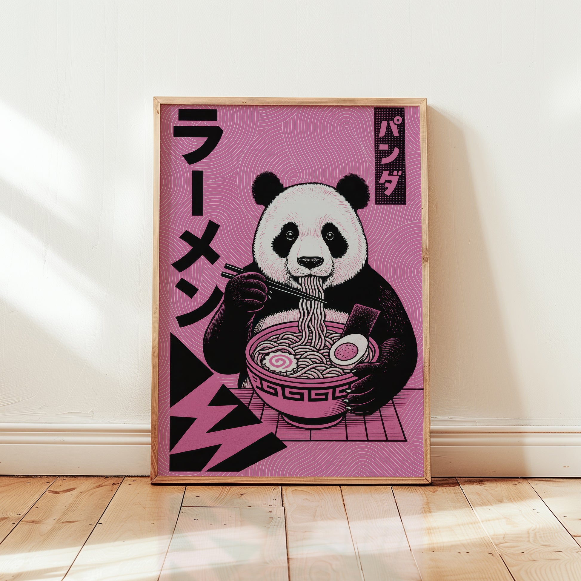 Framed ramen panda Japanese art print in wooden frame, manga style illustration with black and white panda eating ramen on bold purple pink background
