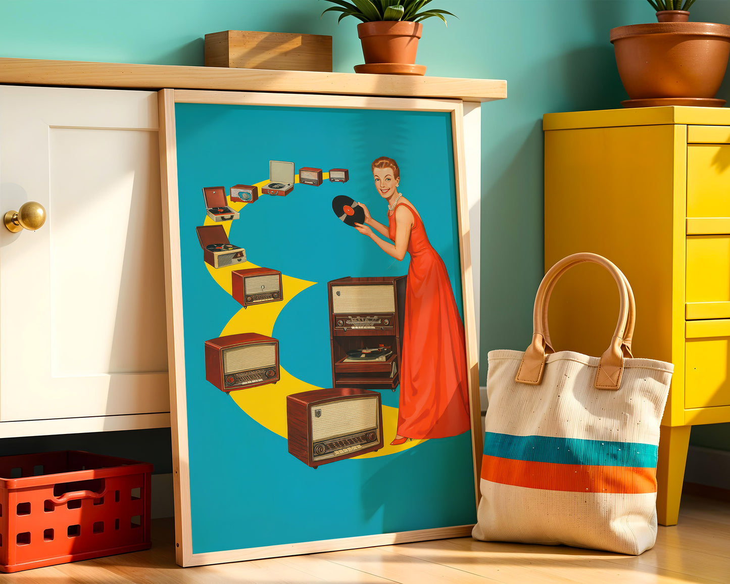 Framed artwork of a woman in a red dress surrounded by vintage radios on a blue background, placed on a wooden surface with a colorful bag and furniture in the background.