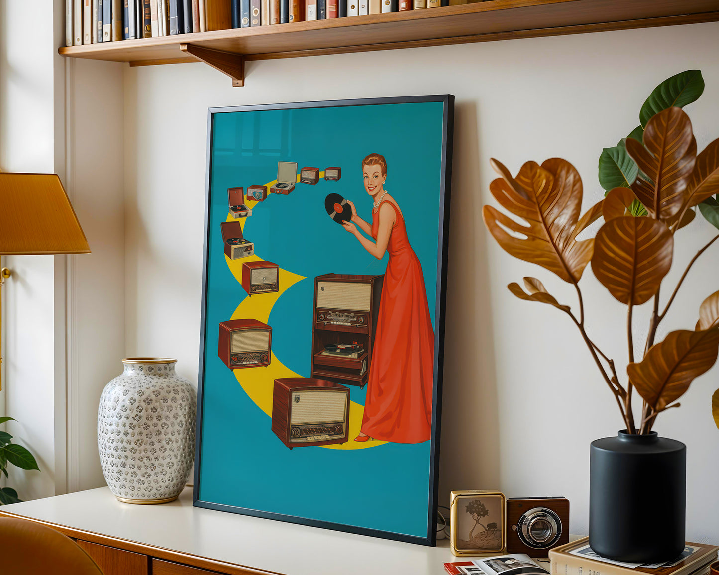 Framed artwork of a woman in a red dress with vintage radios on a shelf with books and decor.