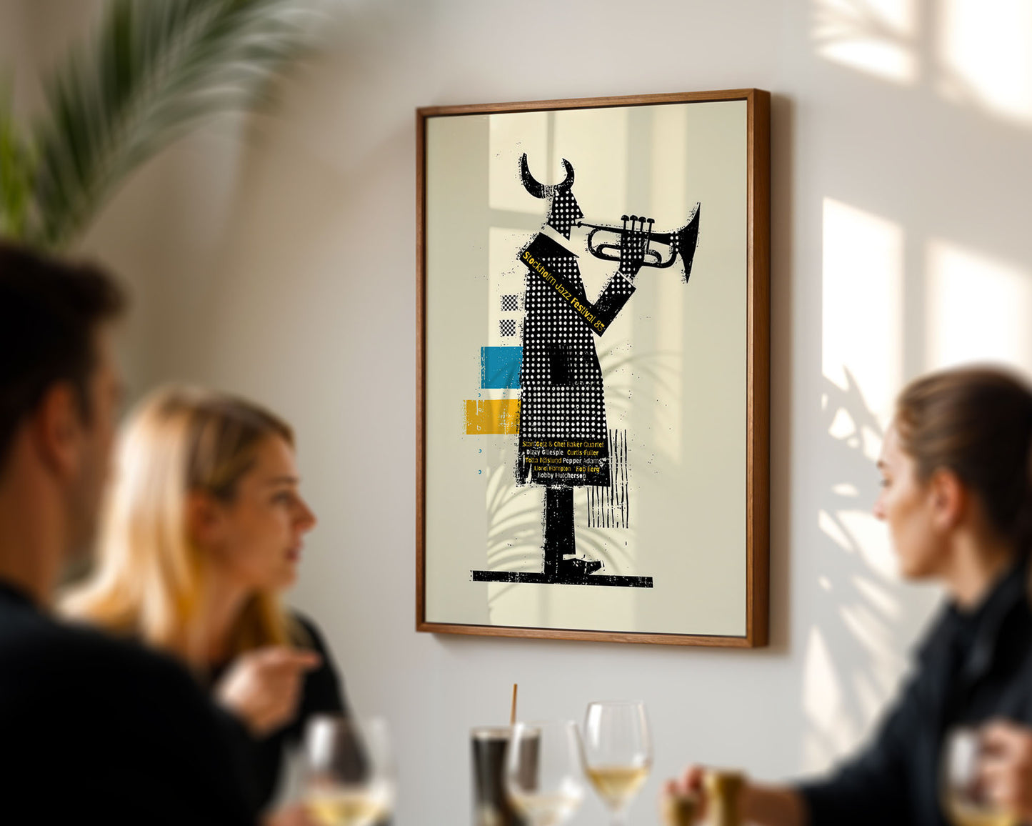 Framed artwork of a person playing a trumpet on a wall in a social setting.