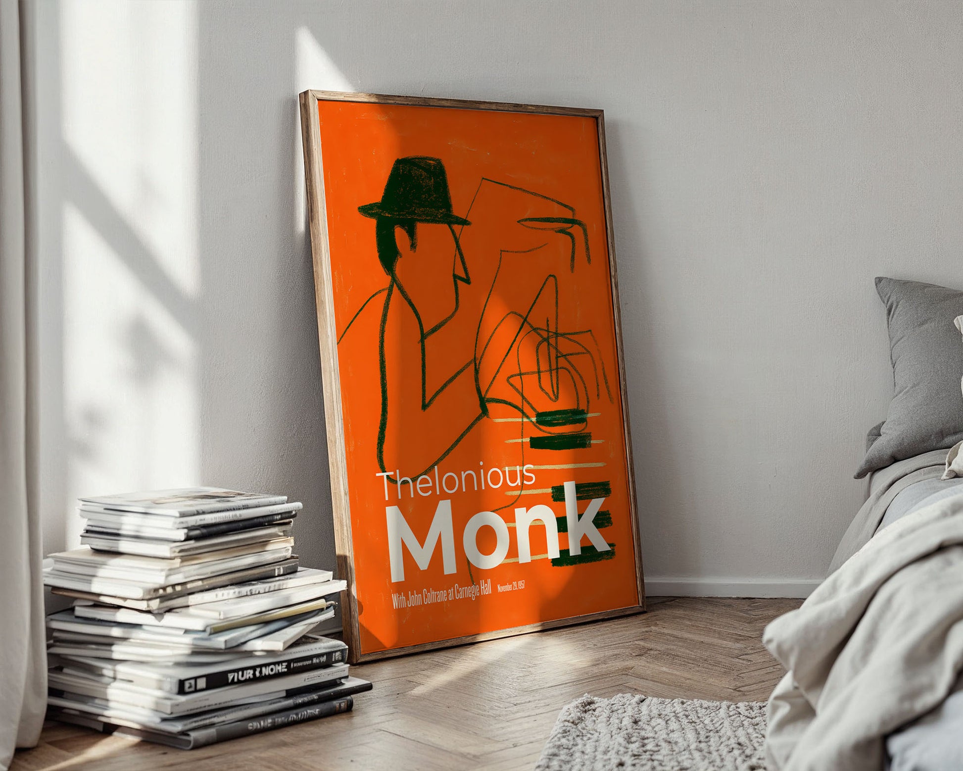 Orange poster of Thelonious Monk in a room with books and a bed.