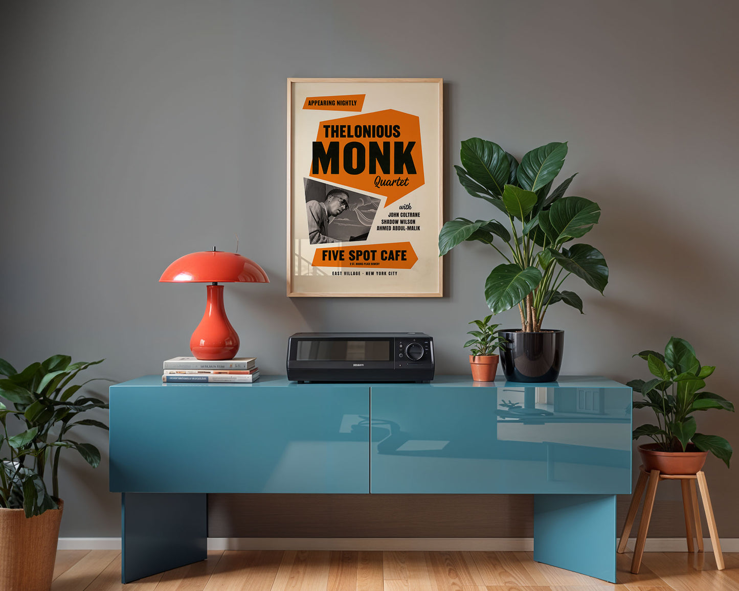 Modern living room with dark academia  Thelonious Monk Jazz print on gray wall.