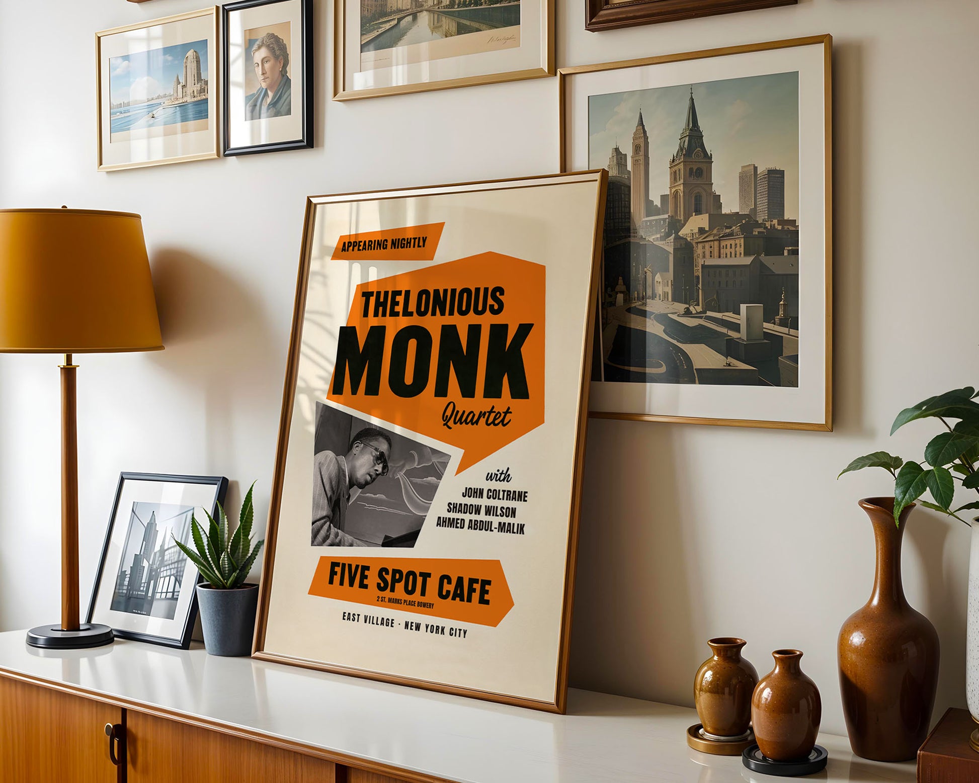 vintage jazz festival poster of Thelonious Monk on a wall with decorative items.