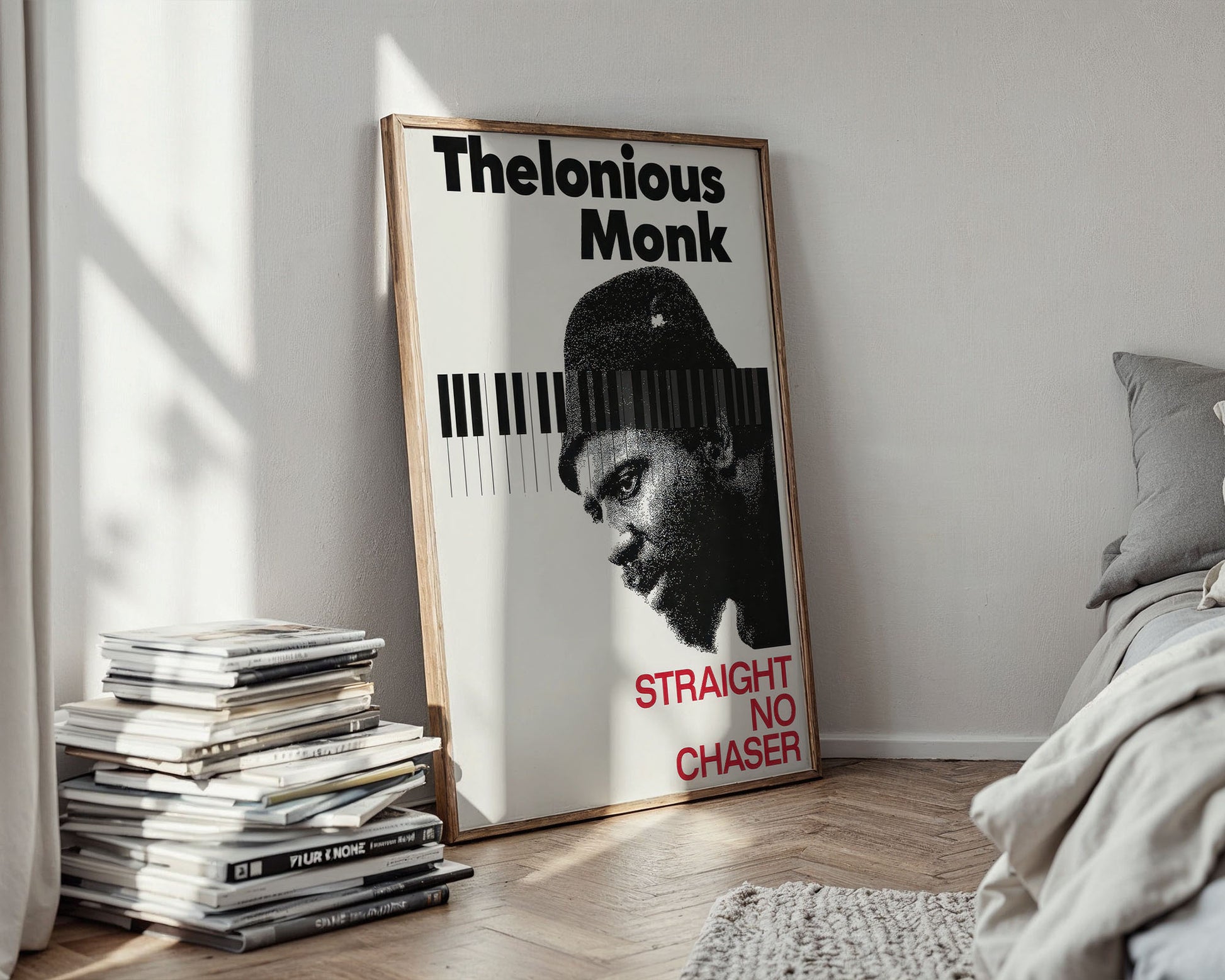 Framed poster of Thelonious Monk in a room with books and a bed.
