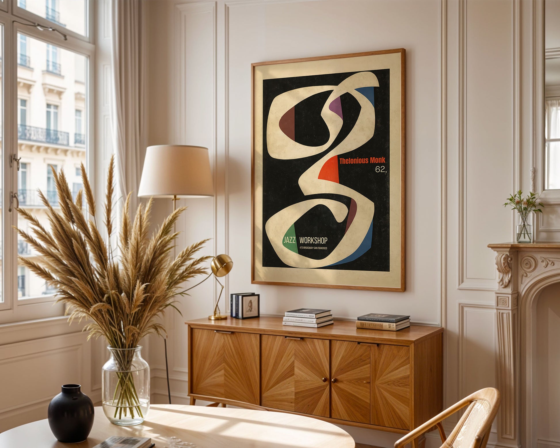 Living room with wooden cabinet, abstract art, and decorative items.