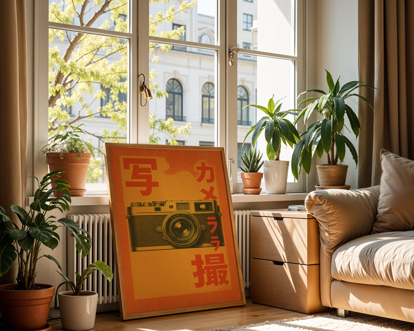 Living room with a large window, plants, and a decorative sign with a camera illustration.