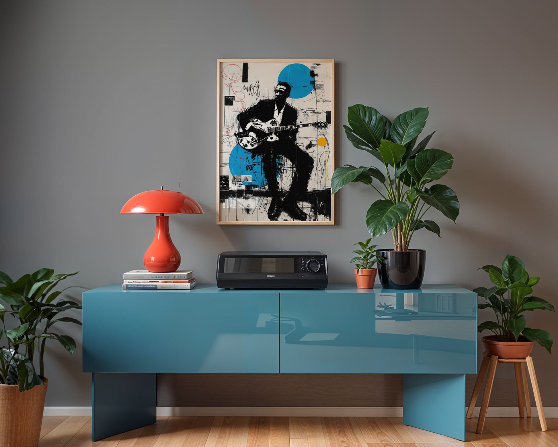 Modern living room with a blue console table, red lamp, and framed jazz blues artwork on a gray wall.