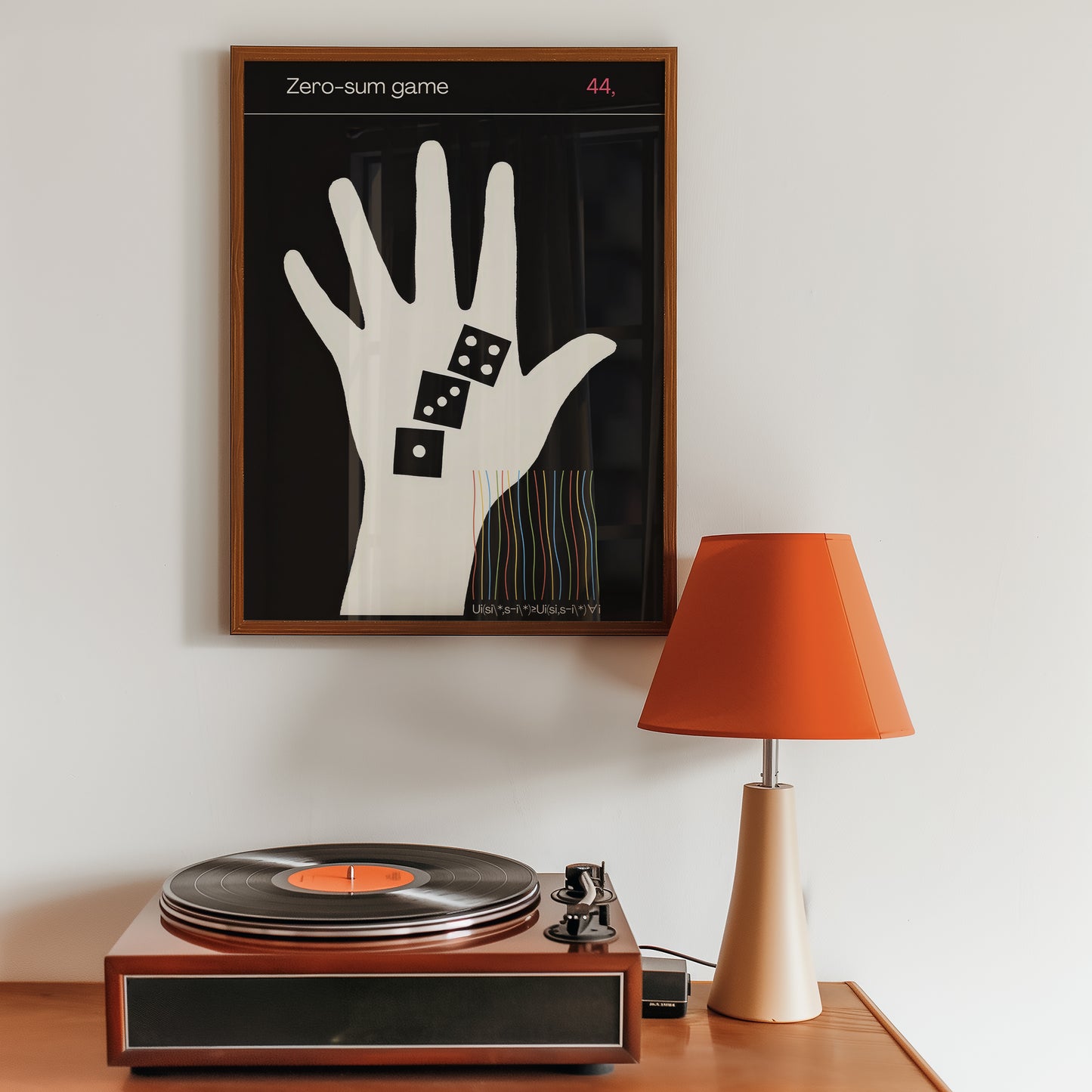 Wooden record player on a table with a framed artwork of zero sum game printtheory 